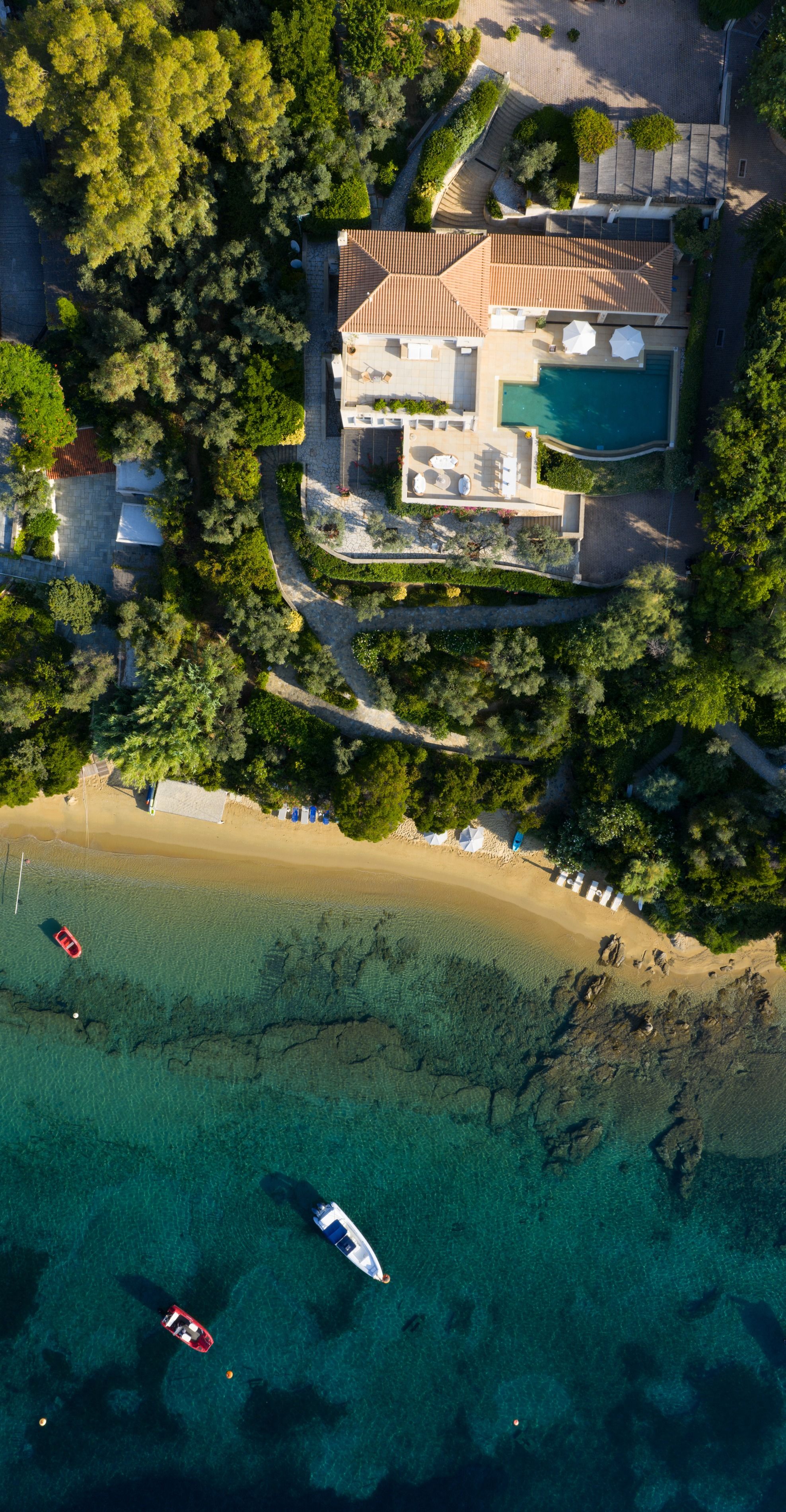 Villa Goldie from above, with the beach and the bay directly below