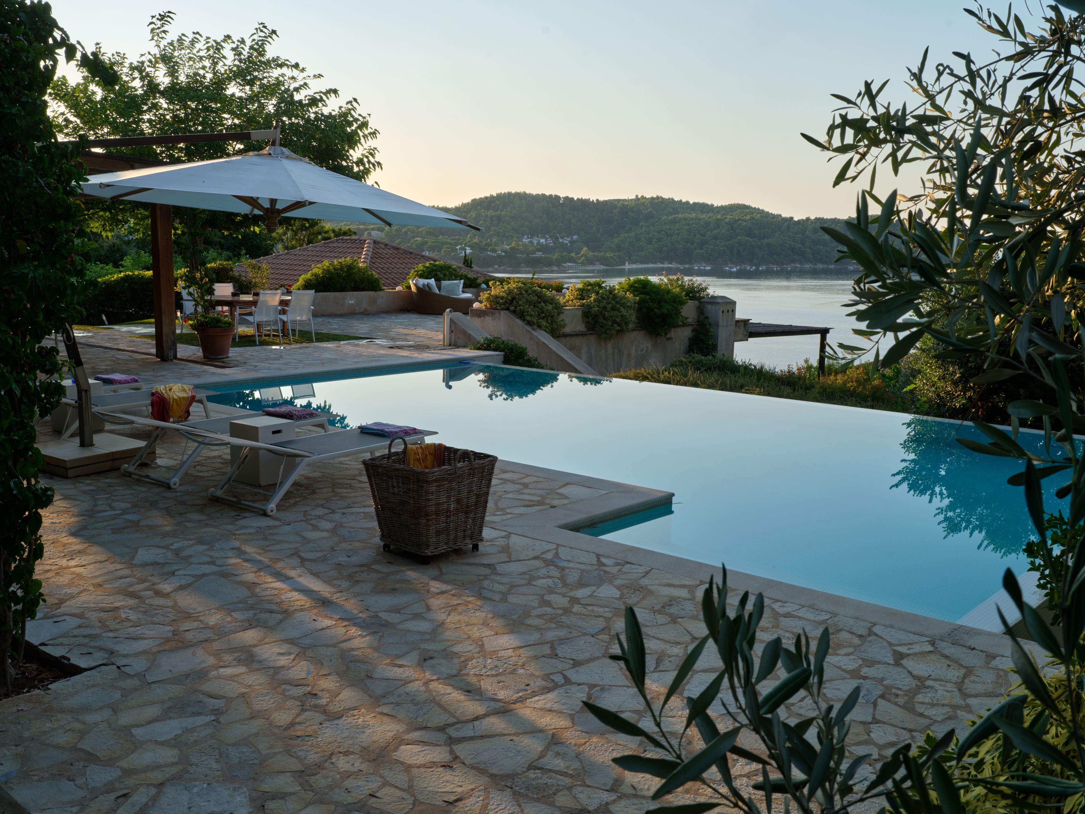 The pool at sunset, the island across the bay