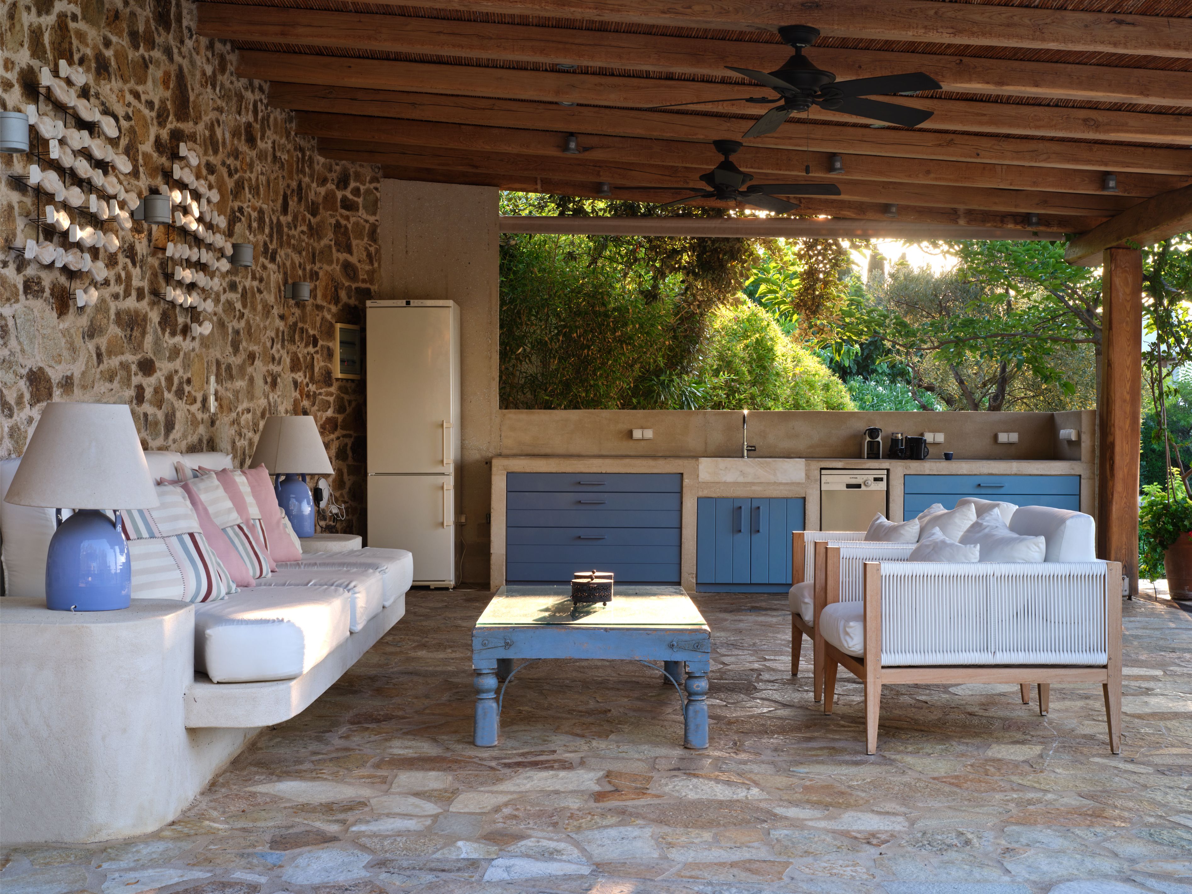 The outdoor kitchen under the covered terrace